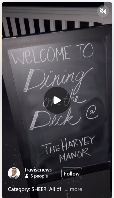 A chalkboard sign welcoming guests to 'Dining on the Deck' at 'The Harvey Manor.'